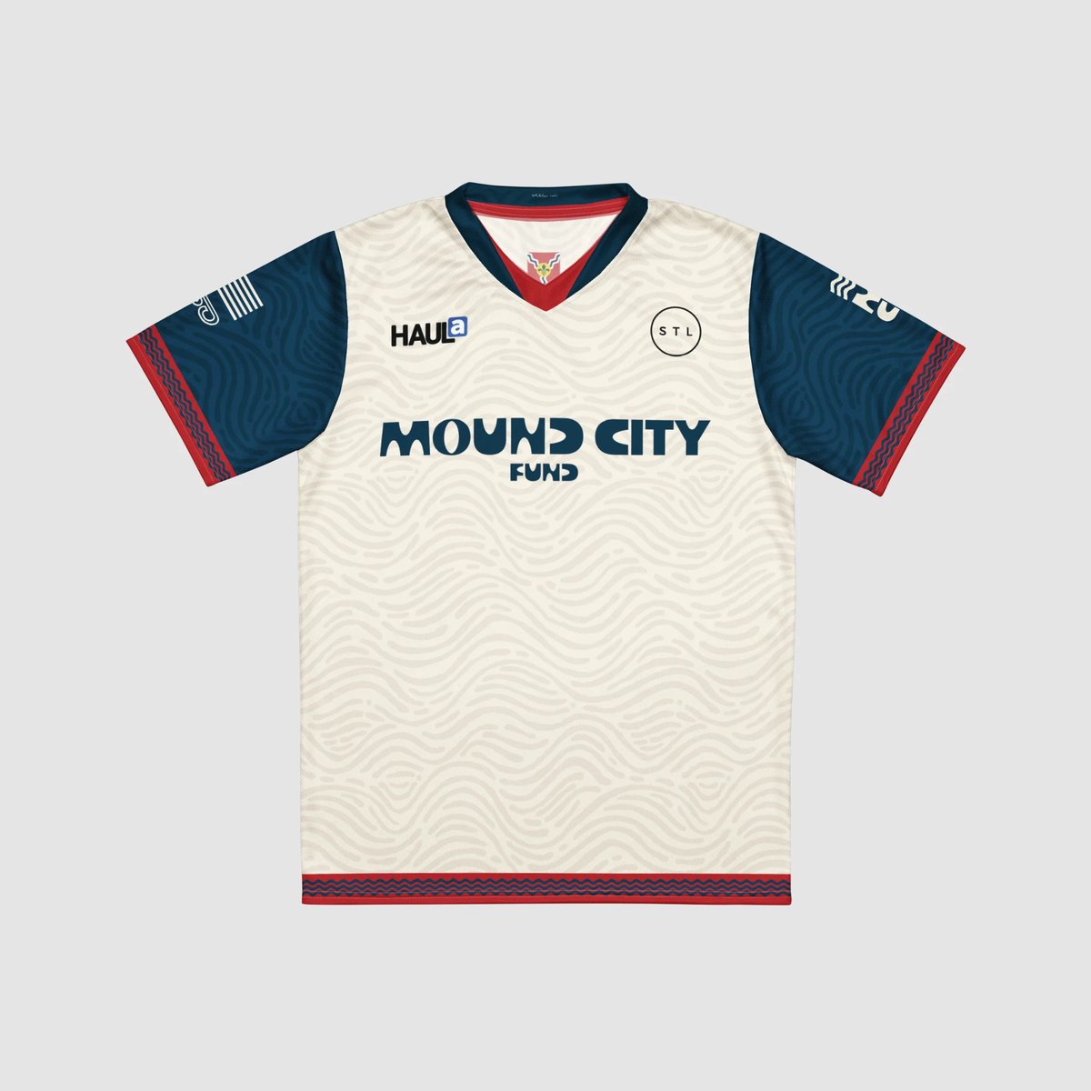 Mound City Fund Giveback Jersey: a cream soccer jersey with a topographic mound pattern, navy sleeves, red trim, and MOUND CITY FUND across the chest
